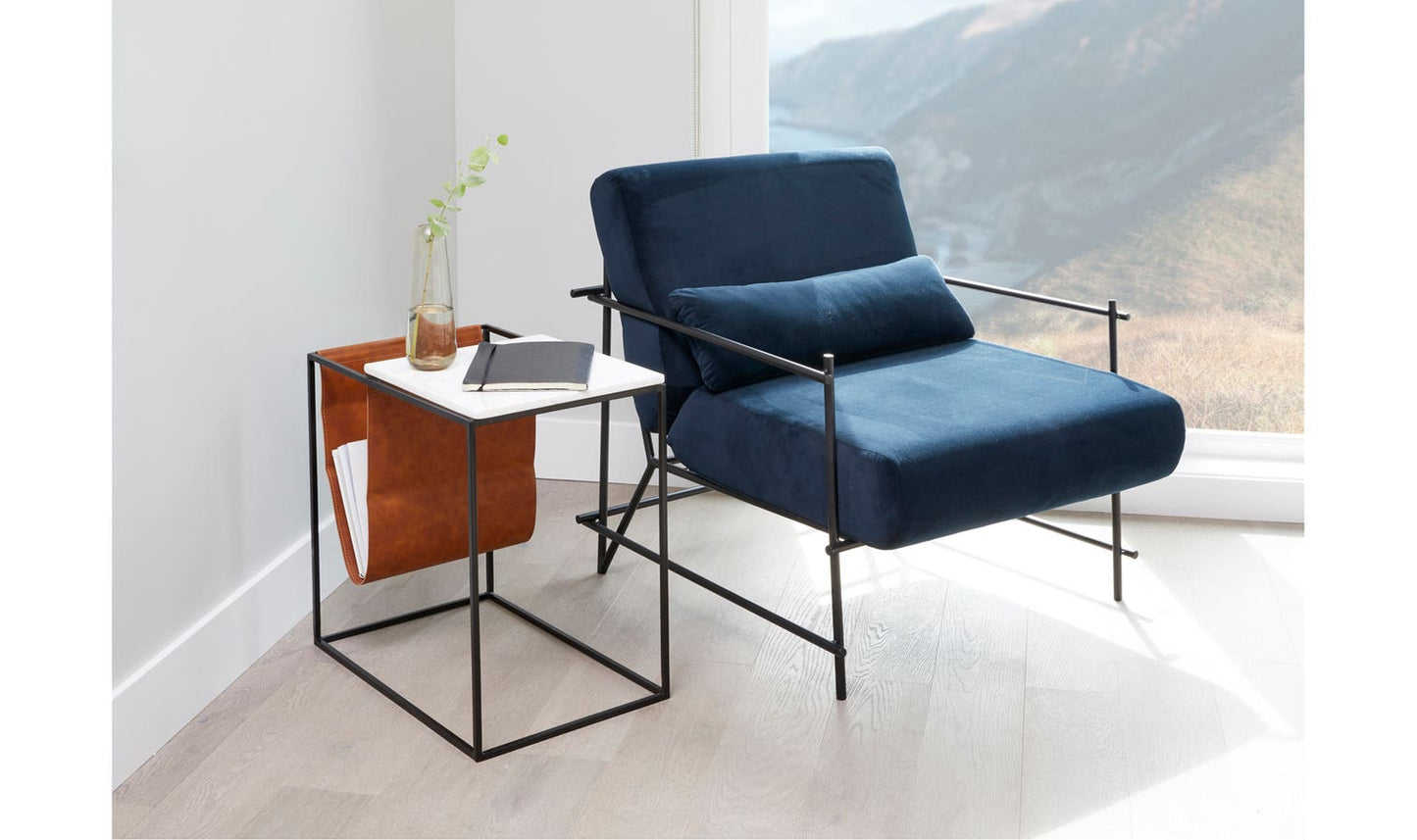 CAVE MAGAZINE RACK