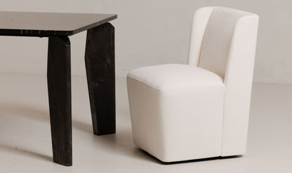CORMAC ROLLING DINING CHAIR